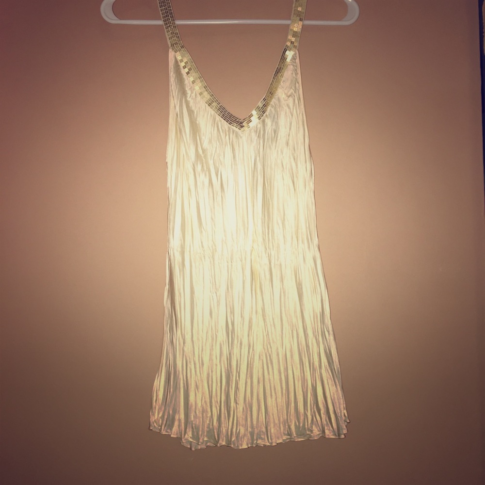 Silky white blouse with gold trimming